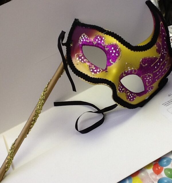 A Masquerade Mask Gold Purple on dowel
